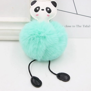 Cute panda pompom keychain in mint green faux fur for bags and car accessory decoration