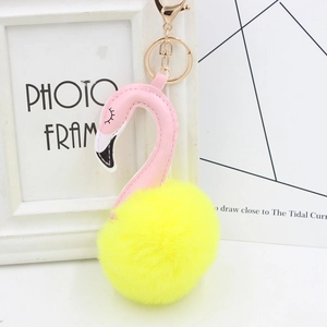 Detailed view of pink plush flamingo keychain with gold alloy lobster clasp and ring