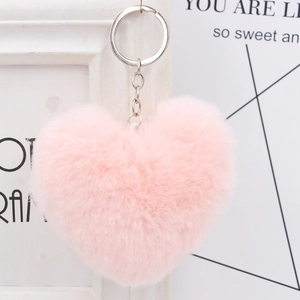 Plush heart-shaped keychain in soft pink faux fur with a silver metal ring and chain