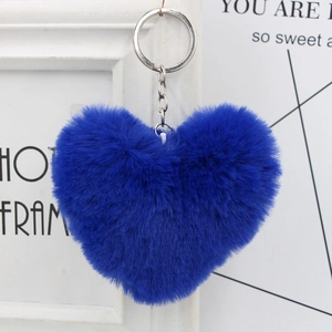 Detail view of plush heart-shaped keychain in royal blue with silver metal ring and chain