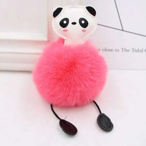Close-up of cute panda plush keychain with rose red faux fur pompom and cartoon leather head