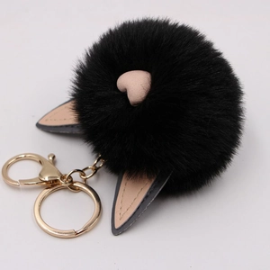 Porte-clés mignon en peluche noire avec oreilles de chat et fermoir doré brillant