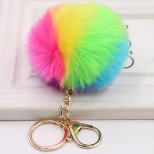 Rainbow faux fur keychain with fluffy gradient pompom and golden lobster clasp