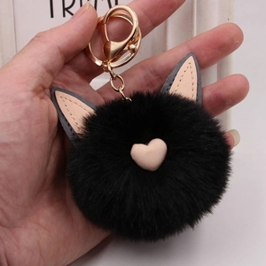 Porte-clés pompon en fourrure noire avec oreilles de chat roses pour sacs à main