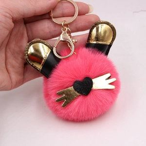 Porte-clés chat en peluche rose avec oreilles dorées pour sac ou accessoire de voiture