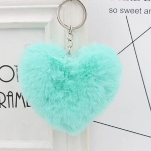 Detail of soft heart-shaped plush keychain in mint green with silver metal ring