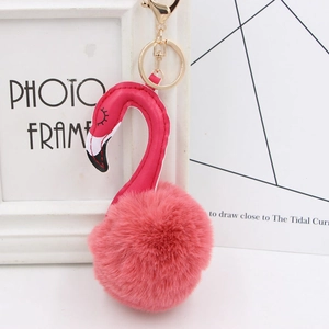 Detailed view of pink plush flamingo keychain with premium gold metal clasp and soft fur