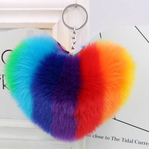 Detailed view of rainbow faux fur heart keychain with soft plush texture and silver metal ring