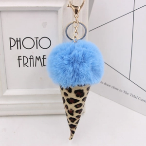 Close-up of leopard print cone and sky blue plush fur ball ice cream keychain