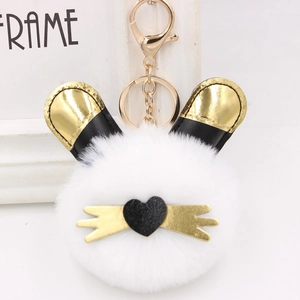 Porte-clés mignon lapin en peluche blanche avec oreilles dorées et fermoir doré
