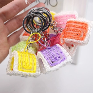 Mini portachiavi a bustina intrecciato a mano in cotone colorato per borse e chiavi