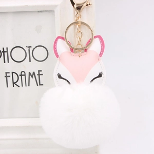 Pink and white fox PU leather pompom keychain with a fluffy white faux fur ball