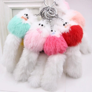 Plush fox and mouse keychain set in four vibrant colors with long faux fur tails