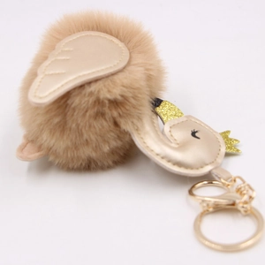 Swan faux fur pompom keychain in khaki with gold glitter accents and metal hardware