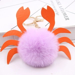 Porte-clés crabe en peluche violette avec pattes en similicuir orange et anneau doré