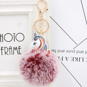 Rainbow unicorn keychain with fluffy dark red and pink faux fur pompom and gold ring