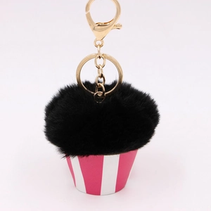 Cute cupcake keychain with black faux fur pom pom and pink striped base for women's bags