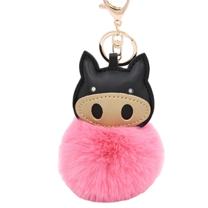 Creative cartoon pig plush pompom keychain with golden clasp and pink fluffy ball