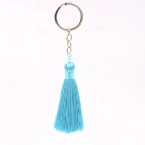 Bohemian light blue tassel keychain with silver metal ring and decorative thread wrapping