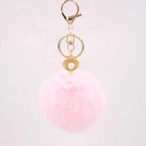Pink faux fur pompom keychain with gold seashell pearl charm and lobster clasp for bags