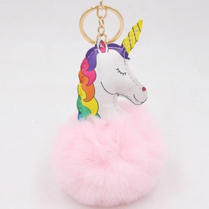 Porte-clés licorne en peluche avec tête en similicuir blanc et pompon rose duveteux