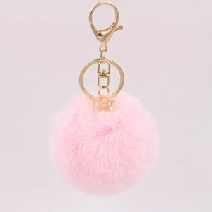 Pink faux rabbit fur pom pom keychain with gold geometric pendant for bags and car keys