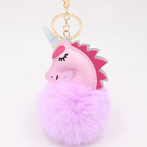 Pink faux leather unicorn keychain with fluffy lavender fur pompom and golden keyring clasp