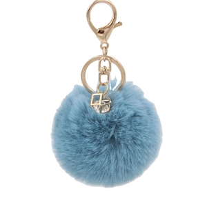 Sky blue faux rabbit fur keychain with gold geometric pendant and sparkling zircon stone