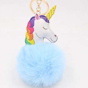 Porte-clés licorne en peluche avec crinière arc-en-ciel et pompon en fourrure bleue