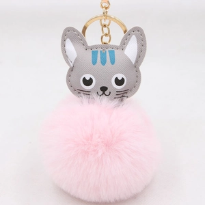 Porte-clés chat mignon en cuir avec pompon rose duveteux et chaîne dorée