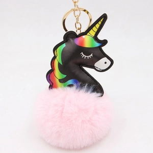 Black unicorn leather keychain with large pink pom pom and golden metal ring