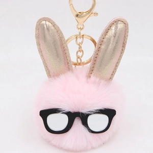 Porte-clés lapin en peluche rose avec oreilles pailletées, lunettes et fermoir doré