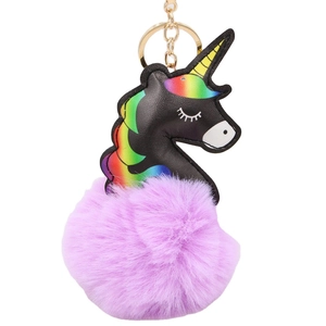 Cute black unicorn keychain with purple faux fur pompom and golden keyring for bags