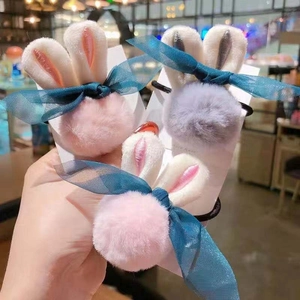 Chouchous mignons oreilles de lapin en peluche pour filles avec pompons et nœuds