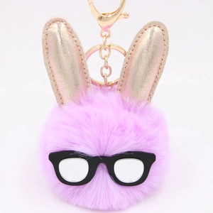 Porte-clés lapin en peluche lavande avec oreilles dorées et lunettes sur anneau