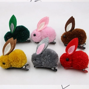 Set of six colorful 3D plush rabbit ear hair clips with soft pompom texture for kids