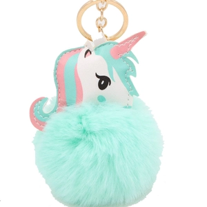 Cute mint green unicorn pom pom keychain with plush ball and faux leather bag charm