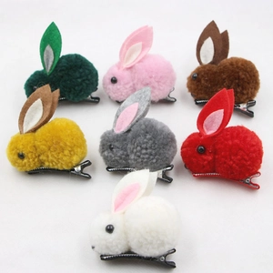 Plush bunny ear hair clips for girls in seven colorful felt and fur ball designs