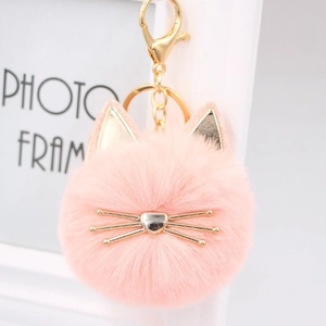 Cute pink plush cat ball keychain with golden ears and metal whiskers for bags