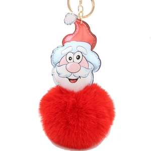 Christmas Santa Claus keychain featuring a large red plush pom pom and PU leather charm