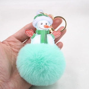 Plush snowman keychain with mint green faux fur pompom and golden keyring holder