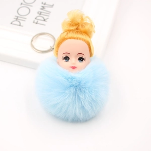 Porte-clés poupée endormie avec pompon en peluche bleue et cheveux dorés pour sacs à main