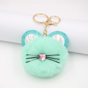 Cute mint green fluffy cat fur ball keychain with pink heart nose and golden metal hook