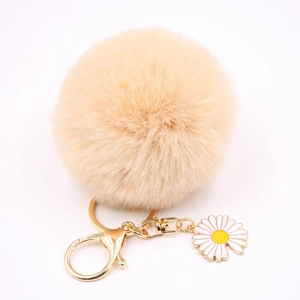Porte-clés marguerite en peluche beige avec pompon doux et anneau doré chic