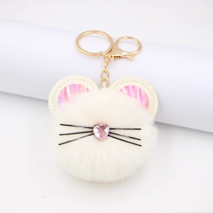 Cute fluffy cat keychain with cream fur, pink heart nose and golden metal lobster clasp