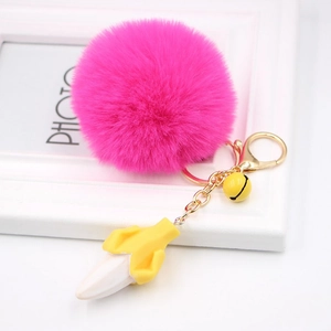 Creative rose red faux fur pompom keychain with yellow banana pendant and golden clasp