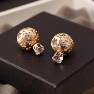Golden double bead earrings with floral hollow design and sparkling zircon accents