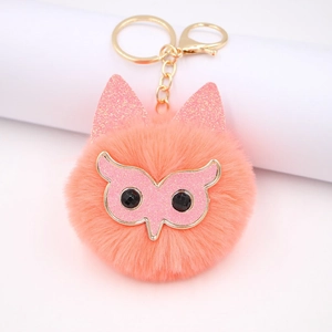 Schattige roze uil pompon sleutelhanger met glitteroren en gouden metalen clip