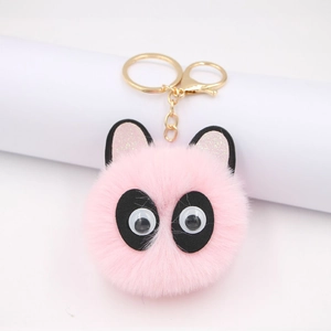 Cute pink panda pom pom keychain with fluffy faux fur and gold hardware for bag accessory