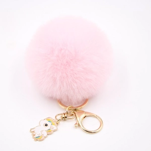 Porte-clés pompon rose avec fermoir doré et pendentif licorne pour sac à main